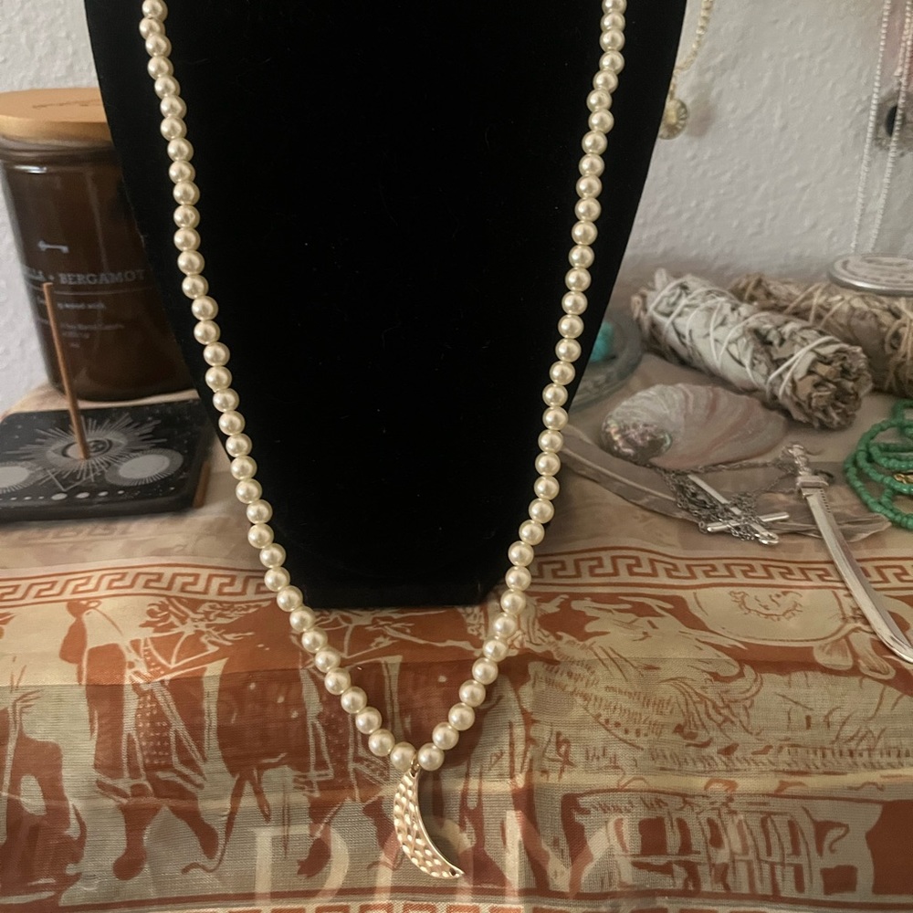 Pearl necklace with gold moon